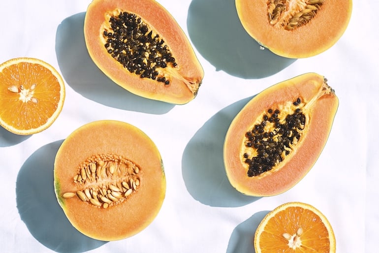 Fresh papaya, cantaloupe and oranges