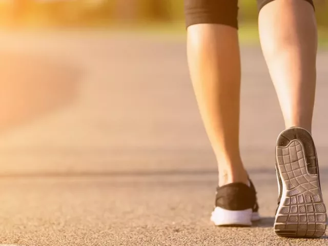Close up of woman walking from behind