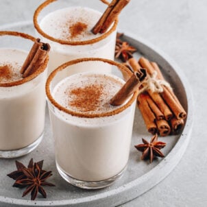 How to Make Eggnog. Three glasses of healthy eggnog.